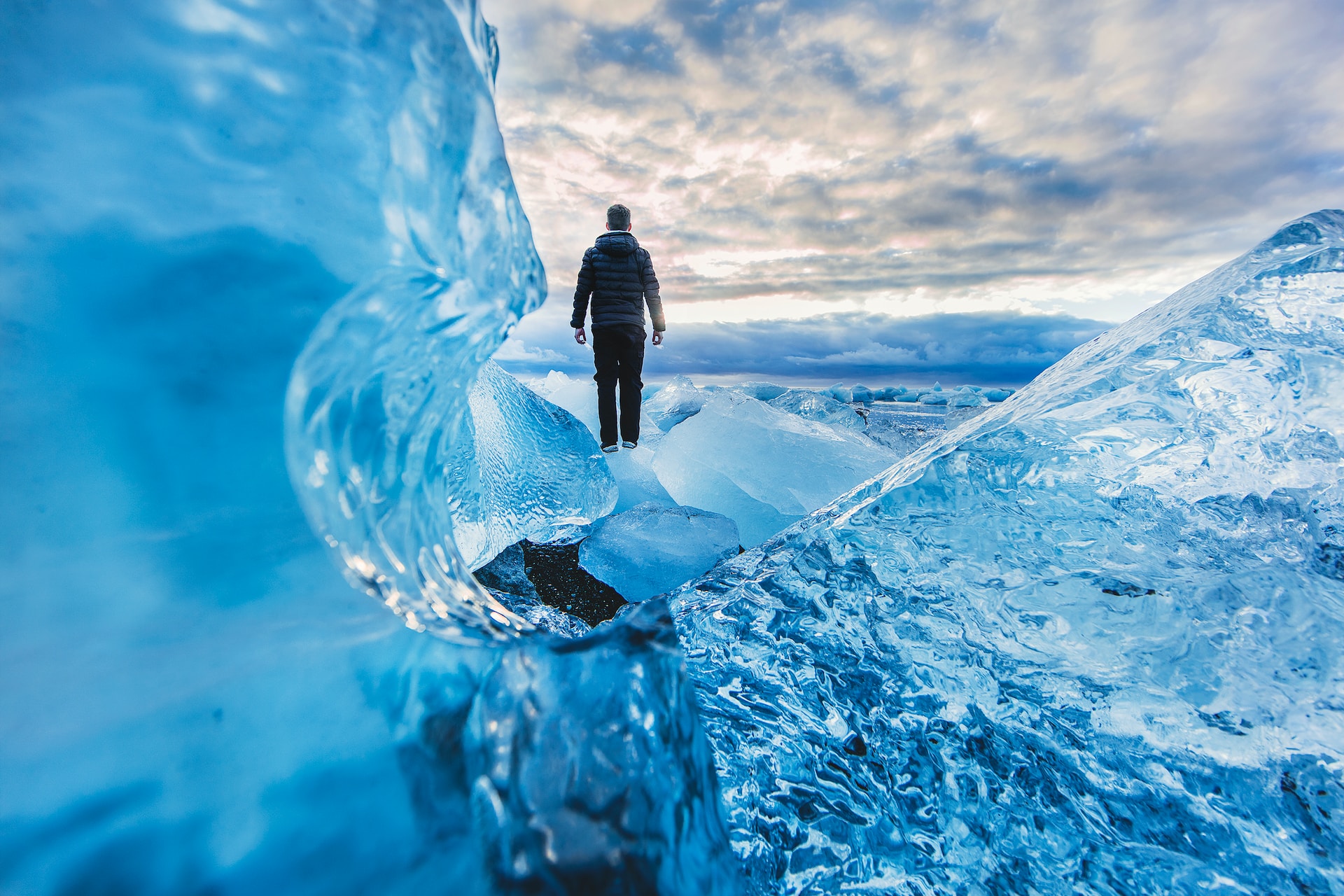 Man standing on glacier.