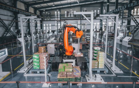 A robotic machine in a manufacturing factory