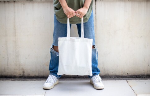 Person holding a tote bag
