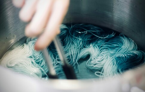 Someone dyeing fabric.