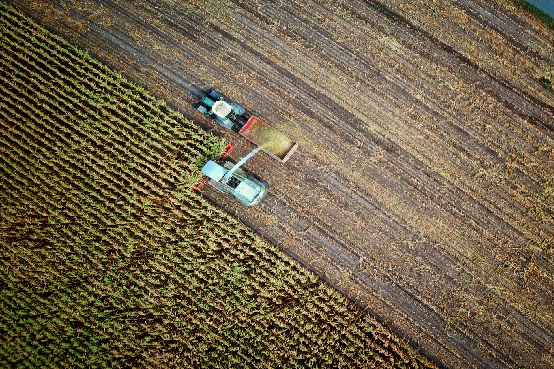 tractor plowing a wide field