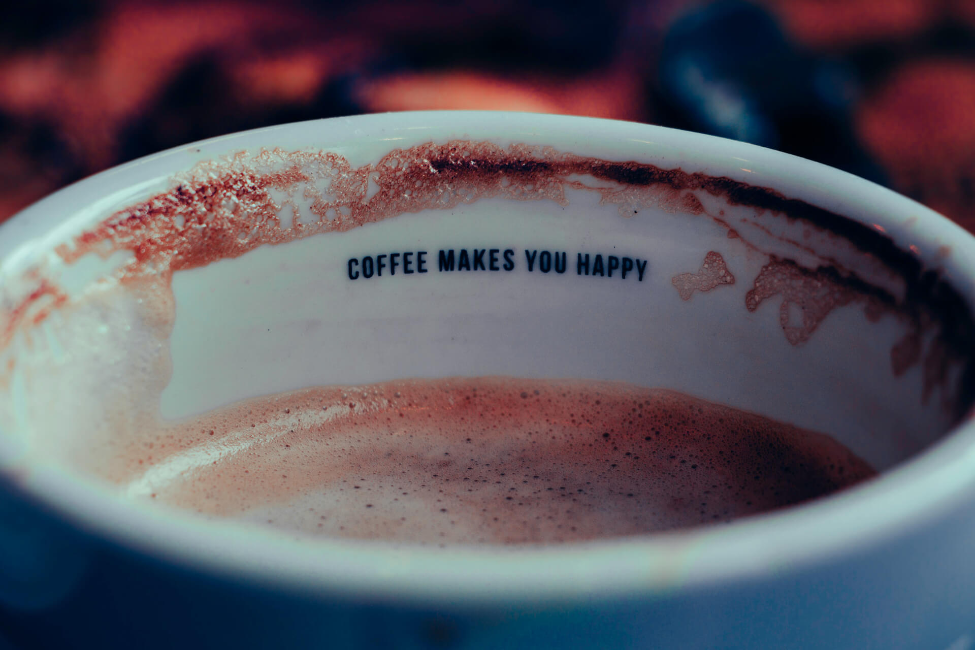 a coffee mug saying coffee makes people happy