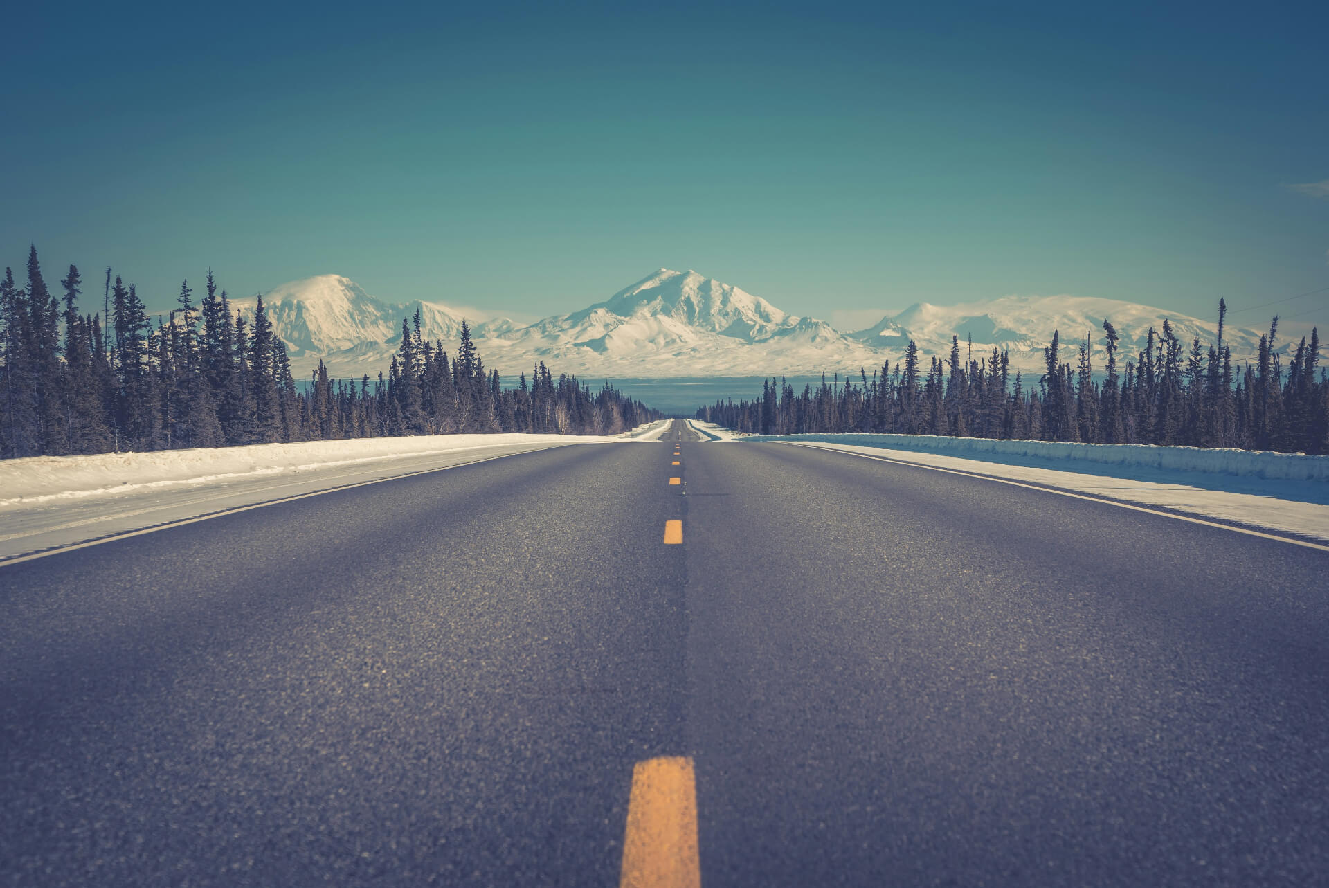 road in Alaska leading to mountain