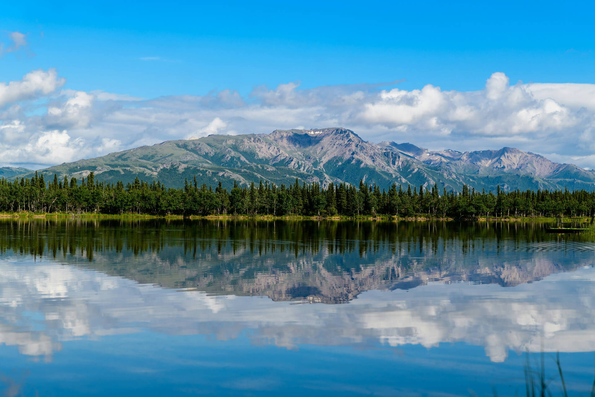 alaskan lake with mountains on horizon