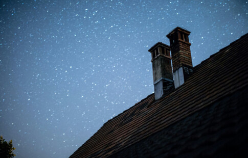 chimneys against starry sky