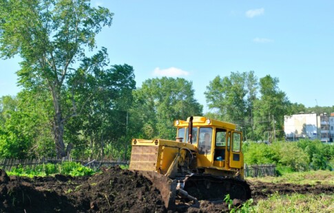 backhoe removing soil