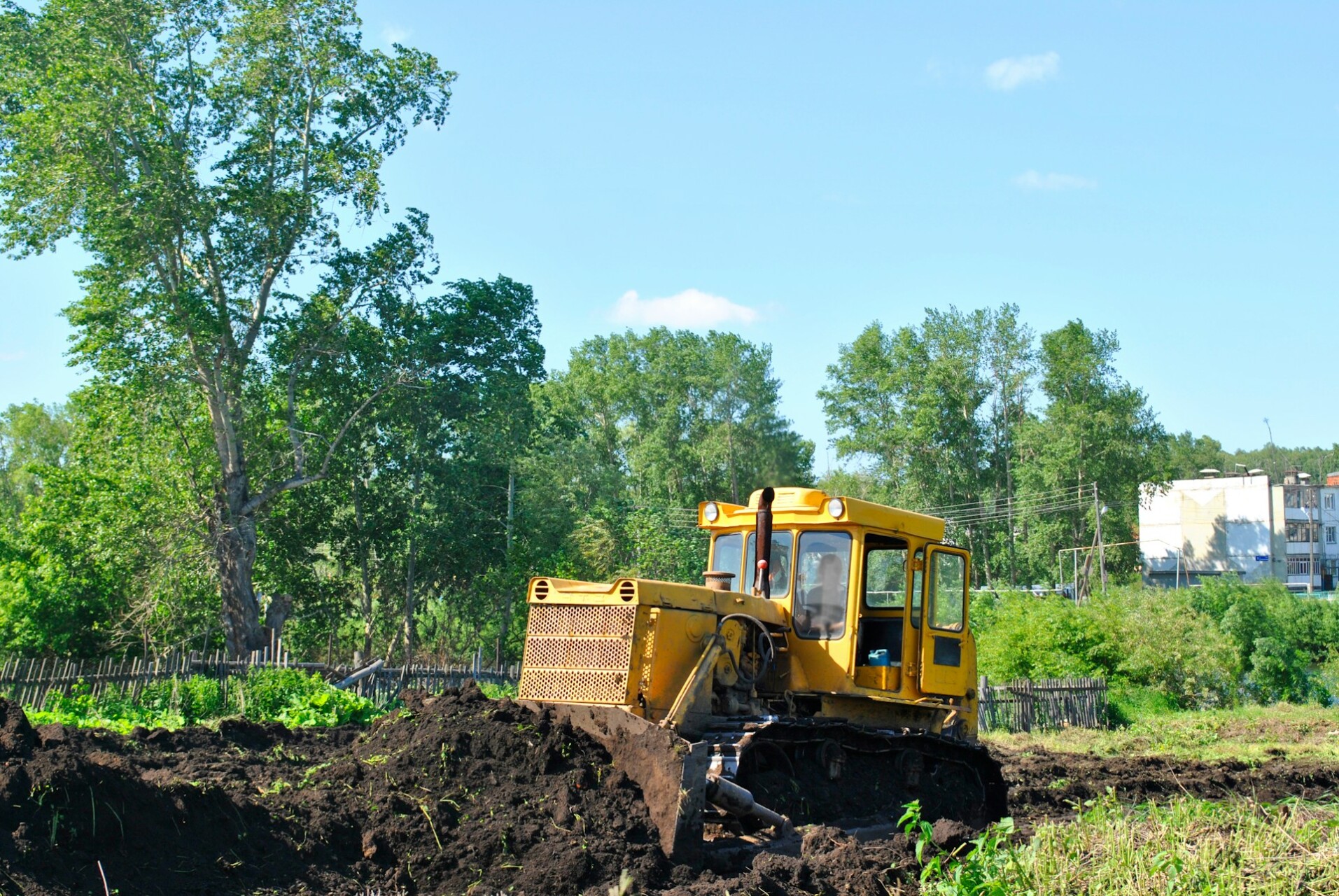 backhoe removing soil