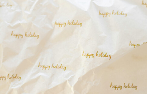 paper with font saying happy holiday